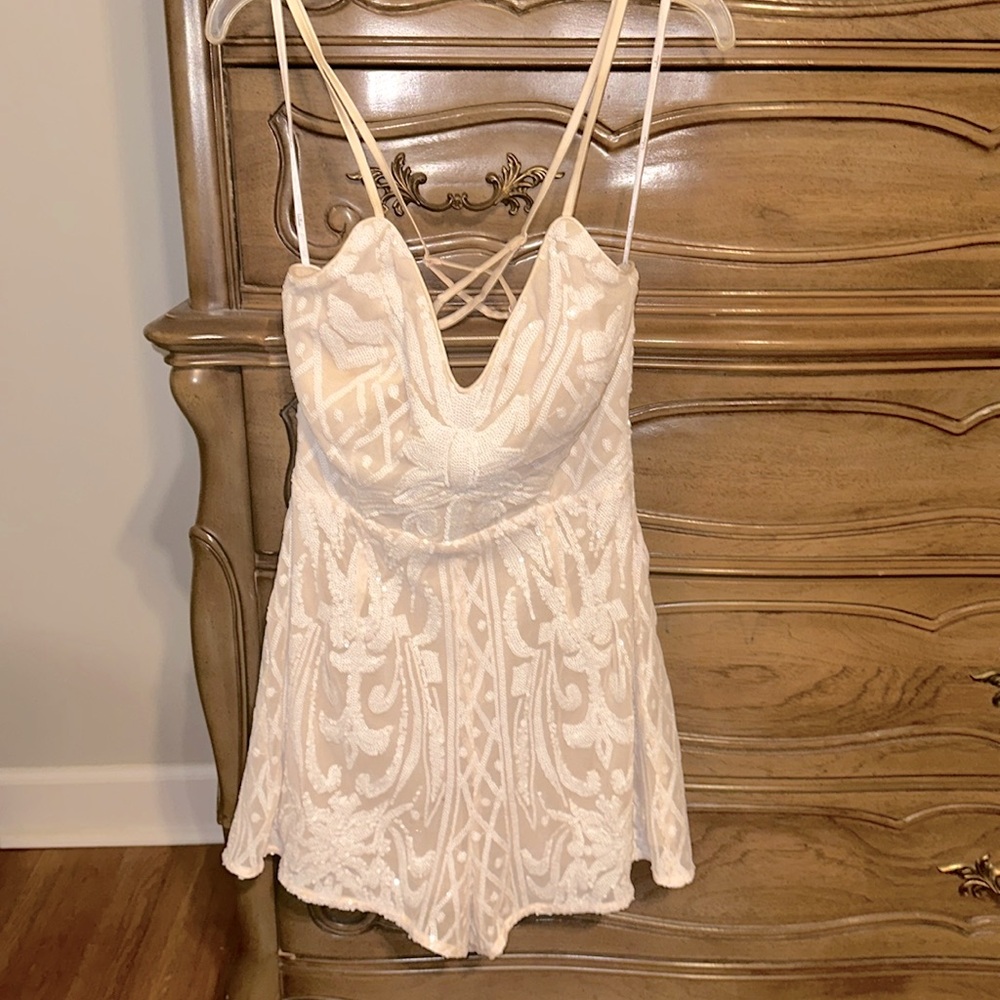 Lulu’s nude and white sequence romper